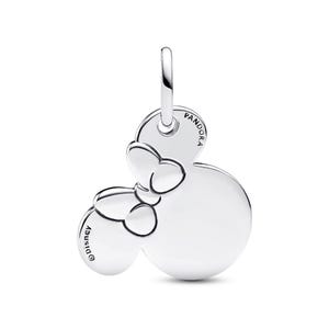 A silver-colored charm pendant in the shape of a Mickey Mouse, with the word "Disney" engraved on it.