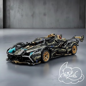 May include: A black and gold race car model with teal accents. The model features intricate detailing, gold wheels, and a rear spoiler. The car is set against a gray background, showcasing its sleek design and construction.