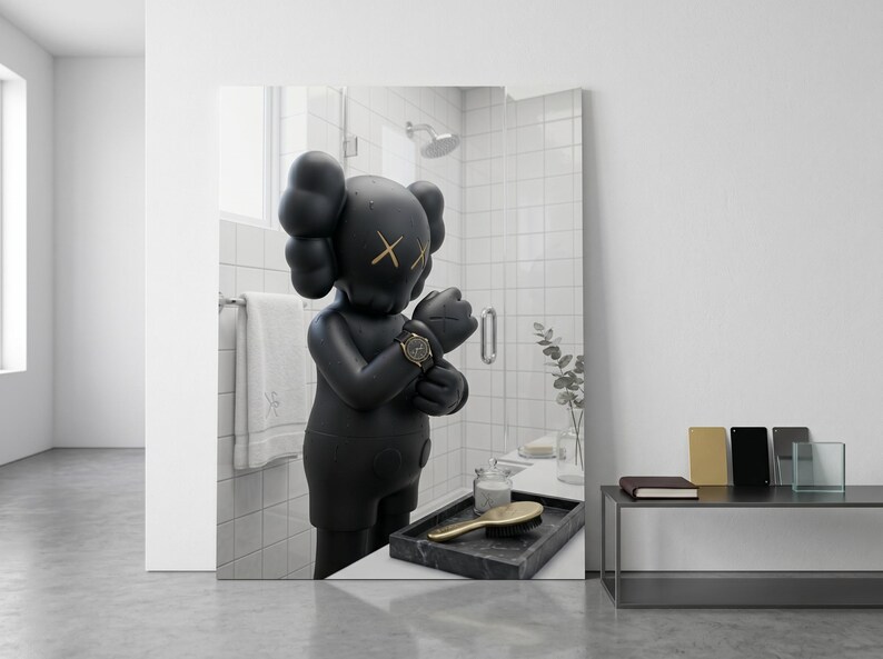 May include: A matte black KAWS figure with signature X-eyes and gloved hands stands in a tiled bathroom. The figure wears a dark wristwatch on its left wrist. A black marble tray with a gold-toned hairbrush and a glass jar sits in the foreground.