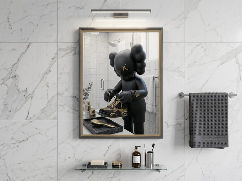 May include: A rectangular wall mirror with a dark frame displaying a reflection of a black cartoon-style figure with X-shaped eyes. The figure is holding a black and gold sneaker. The mirror is mounted on a white marble-tiled wall above a glass shelf.