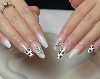 Cute Cow Print Almond Press On Nails, Nude French Tip Nails with Chrome Star Accent, Glossy Minimal Nail Set, Reusable Glue On Nails