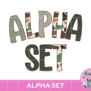 May include: The text ALPHA SET is displayed in a bold, arched font. The letters feature a mix of solid olive green, light beige, and a multi-colored camouflage pattern in shades of brown, green, and tan, with a thin stitched outline effect.