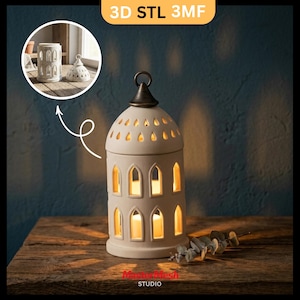 May include: A cream-colored ceramic lantern with arched windows and a decorative top. The lantern is lit from within, casting a warm glow. The image also shows a smaller, matching piece and the text "3D STL 3MF" and "Master Mesh STUDIO".