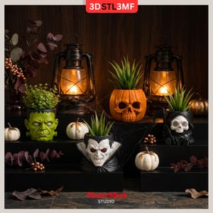 May include: A collection of four character-themed planters featuring a green monster, an orange skull, a vampire, and a grim reaper, each holding a small green plant. Two dark metal lanterns with glowing lights are positioned behind the planters.