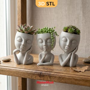 May include: Three light gray planters shaped like human heads with closed eyes and hands resting near the face. Each planter holds a different green succulent plant. The text 3D STL appears at the top and MasterMesh STUDIO at the bottom.