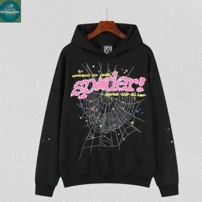 May include: Black hooded sweatshirt with a spider web design. The front features the word "spider!" in pink, with the phrases "neverend the dusk" and "bare the slime" above and below the spider web graphic.