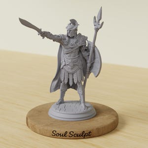 May include: A gray figurine of a warrior in classical armor, holding a sword and a spear. The figurine is mounted on a wooden base with the text "Soul Sculpt". The warrior is wearing a helmet, shield, and cape.