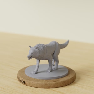 May include: A gray wolf figurine on a wooden base with a gray circular platform. The wolf is in a walking pose, with detailed fur texture. The base has the word "Sculpt" printed on it.