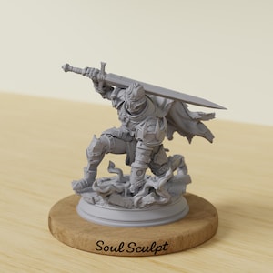 May include: A gray figurine of a knight in full armor, kneeling and holding a large sword overhead. The figurine is on a wooden base with the text "Soul Sculpt" in black. The knight's armor has intricate details.