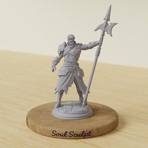 May include: A gray figurine of a warrior holding a spear with a detailed blade. The warrior is wearing armor and a tunic. The figurine is on a wooden base with the text "Soul Sculpt".