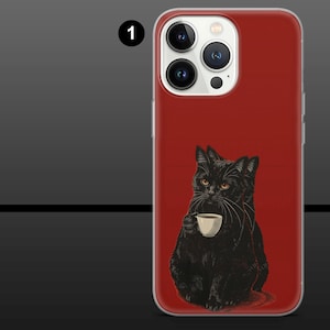 May include: A red phone case featuring a black cat holding a white teacup. The cat has yellow eyes and long white whiskers. The phone case has a clear border and a camera cutout.