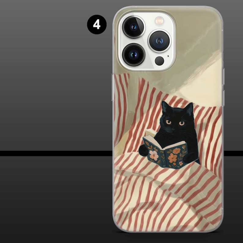 May include: Clear phone case featuring a black cat reading a book in bed. The cat is surrounded by red and white striped bedding and a floral patterned book cover. The case has a clear border.