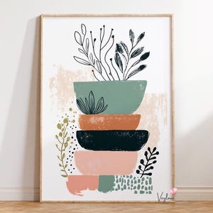 May include: Abstract art print featuring a stack of bowls in shades of green, orange, black, and pink. The bowls are adorned with minimalist botanical illustrations and set against a neutral background, framed in wood.
