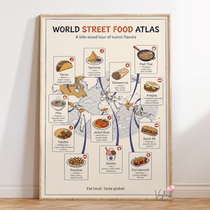 Puede incluir: Un póster enmarcado titulado "World Street Food Atlas" con ilustraciones de platos globales como tacos, pad thai y currywurst. El póster incluye un mapa del mundo y el texto "Eat local. Taste global."