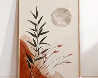 May include: A framed art print featuring a minimalist design. The artwork showcases a large, textured gray circle resembling a moon, with black plant silhouettes and rust-colored brushstrokes against a cream background. The frame is a light wood color.