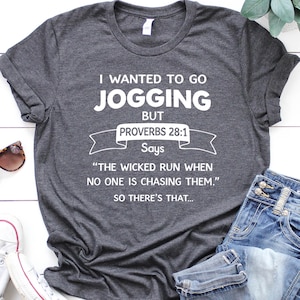 Hilarious Proverbs 28:1 Jogging Shirt, Funny Christian Fitness Tee, Funny Workout Tee, Bible Verse Humor for Non-Runners, Fitness Lover Gift