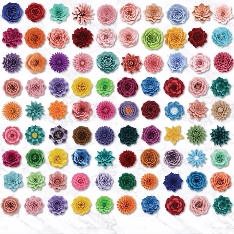 May include: A collection of colorful, paper-crafted flowers in various shapes and sizes. The flowers are arranged on a white marble-patterned surface. Colors include shades of red, pink, orange, yellow, blue, green, and purple. The flowers are likely for crafting or decoration.