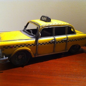 1950s Yellow Cab - New York Checker Vintage Taxi American Automobile Tin Metal Toy