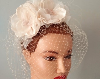 Champagne wedding birdcage veil with champagne wedding flowers fascinator on headban