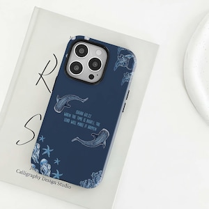 May include: Navy blue phone case featuring a whale shark design with starfish and coral accents. The case includes the text "ISAIAH 60:22 WHEN THE TIME IS RIGHT, THE LORD WILL MAKE IT HAPPEN" and the "Calligraphy Design Studio" logo.