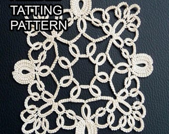 May include: A white needle tatting pattern with a geometric design. The pattern is made up of small loops and knots.