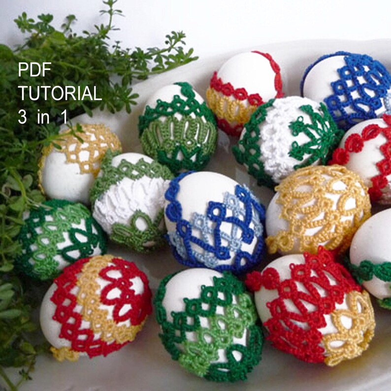 May include: A collection of white eggs adorned with colorful, intricately crocheted lace covers. The lace designs feature various colors, including green, red, yellow, and blue. The image also includes the text "PDF TUTORIAL 3 in 1".
