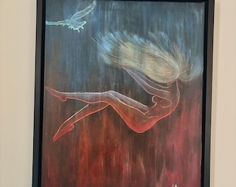 May include: An abstract painting in a black frame depicts a figure falling through a gradient of red and blue hues. The figure is outlined in red, with flowing blonde hair. A bird is depicted in the upper left corner.