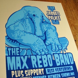 May include: A blue and white poster for The Max Rebo Band, featuring a large blue elephant-like creature. The poster advertises live music at Jabba's Palace, with additional acts and the text "Bounty Hunters Welcome!"