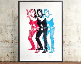 May include: A black and white print of Han Solo from Star Wars. The image is a triptych, with three images of Han Solo in different poses. The image is signed by the artist, "De La Soul".