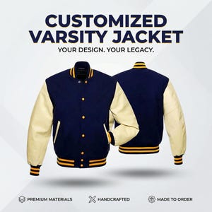 May include: A navy blue and cream varsity jacket with gold detailing. The jacket has a button-up front, ribbed cuffs, and a collar. The image includes the text "CUSTOMIZED VARSITY JACKET" and "YOUR DESIGN. YOUR LEGACY."