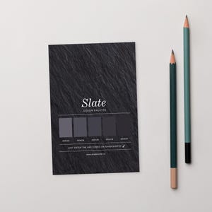 May include: A black slate colour palette card with the word "Slate" and the text "Color Palette". The card displays a series of grey colour swatches with corresponding hex codes. Two pencils, one teal and one dark green, are positioned to the right.