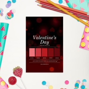 May include: A Valentine's Day color palette card with a dark red background and a gradient of red hues. The card includes the text "Valentine's Day COLOR PALETTE" and hex codes for each color. Pencils and confetti are in the background.