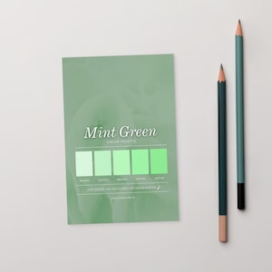 May include: A mint green colour palette card with the text "Mint Green Color Palette" and a series of colour swatches. Two pencils, one dark green and one teal, are positioned to the right of the card.