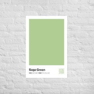 May include: A framed poster with a sage green colour block. The text "Sage Green" is displayed below the colour, along with the HEX and RGB colour codes. A QR code is in the lower right corner.