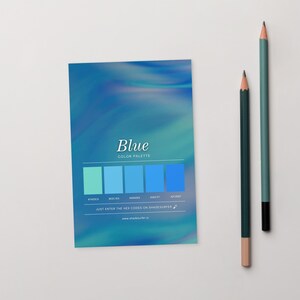 May include: A blue colour palette card with the word "Blue" and the text "Color Palette". The card displays five shades of blue and the text "Just enter the hex codes on shadesurfer". Two pencils are next to the card.