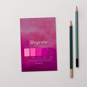 May include: A white ceramic mug with a black handle and the text "But First, Coffee" in a bold, black font. The mug is set against a blurred background, suggesting a cozy setting.