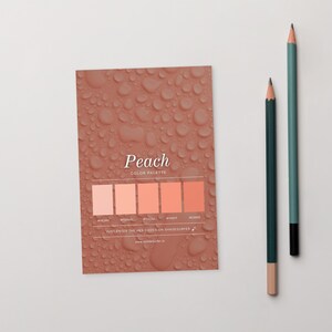 May include: A peach-toned colour palette card with a water droplet texture, displaying five shades of peach. The card includes the word "Peach" and the text "COLOR PALETTE". Two pencils, one teal and one dark green, are positioned to the right.