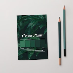 May include: A dark green color palette card with the text "Green Plant COLOR PALETTE" and a series of green color swatches. Two pencils, one dark green and one teal, are positioned to the right of the card.
