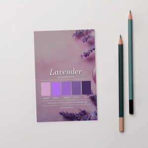 May include: A lavender colour palette card with the word "Lavender" and the text "Color Palette" in white. The card displays a range of lavender shades. Two pencils, one green and one teal, are positioned to the right of the card.