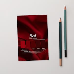 May include: A colour palette card featuring the word "Red" and a series of red colour swatches. The card also includes the text "COLOUR PALETTE" and "JUST ENTER THE HEX CODES ON SHADESURFER". Two pencils, one green and one teal, are next to the card.