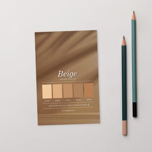 May include: A beige colour palette card displaying six shades of beige, with the words "Beige" and "Color Palette" printed on the card. Two pencils, one teal and one dark green, are positioned to the right of the card.
