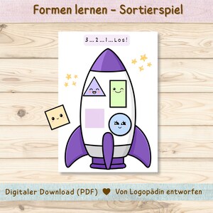 Könnte beinhalten: Ein weiß-lila Raketenschiff mit verschiedenen Formen und dem Text "3... 2... 1... Los!". Das Bild enthält ein gelbes Quadrat und Sternformen. Der Text "Digitaler Download (PDF)" ist ebenfalls vorhanden.
