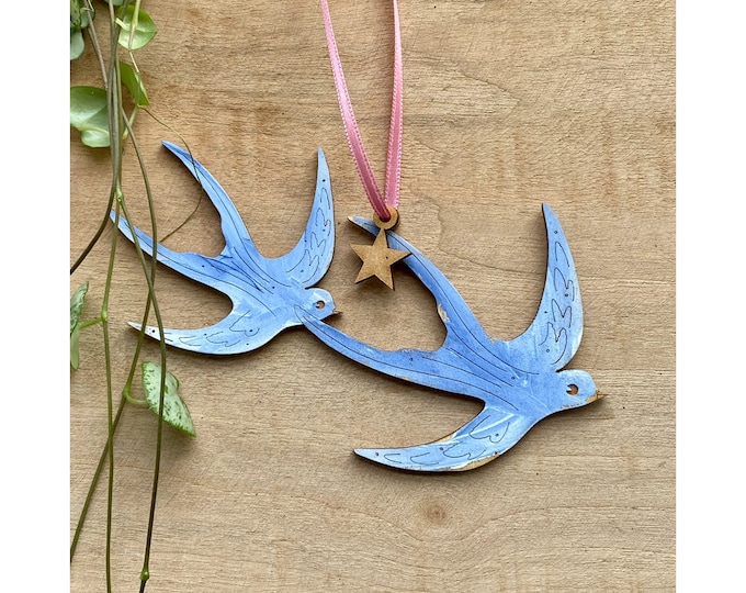 A Hand Painted Swallow Decoration