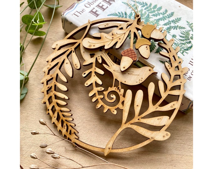 A Hand Painted Songbird Rondel with Oak and Acorns