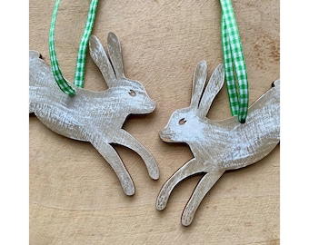 A Pair of Hand Painted Hare Decorations