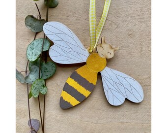 A Hand Painted Bee Decoration