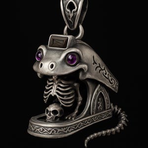May include: A detailed silver pendant featuring a stylized snake head with purple gemstone eyes and a rectangular stone on top. The snake's mouth reveals a small skeleton and skull. The pendant has intricate engraved patterns and a coiled tail.