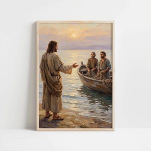 May include: A framed print shows a religious scene with three figures near water. One figure stands on the shore, gesturing towards two others in a wooden boat. The artwork uses warm colours, suggesting a sunset or sunrise over the water.