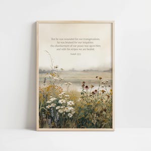 Isaiah 53:5 artwork for home office — calming wildflowers and a soft, hazy sky promote a serene work environment.