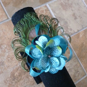 Peacock pearl wrist corsage with teal accent, customizable